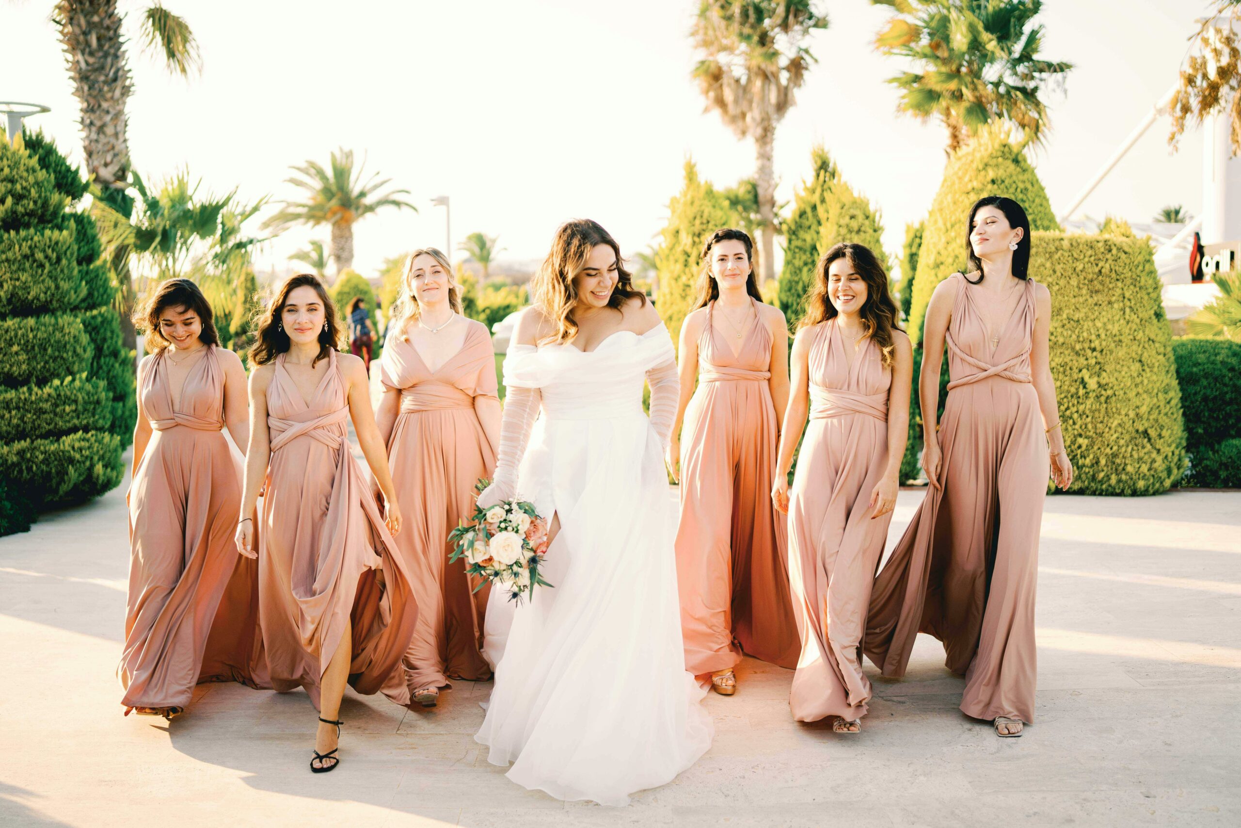 Bride and fashion bridesmaid gowns