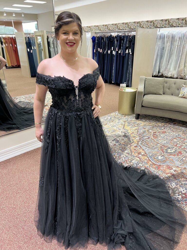 woman wearing a black ballgown at Aurora Bridal in Cocoa Beach, FL