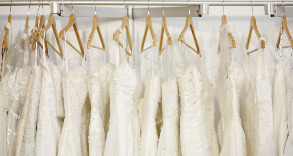 various wedding dress styles hanging in a wedding shop in Melbourne, Florida