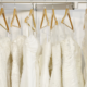 various wedding dress styles hanging in a wedding shop in Melbourne, Florida