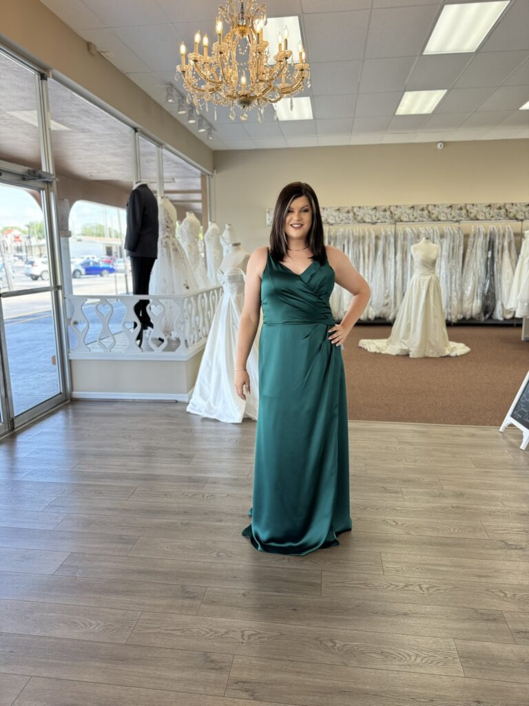 Woman trying on a colorful bridesmaid dress in a Florida wedding shop