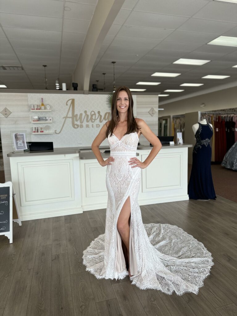 woman wearing a stunning fit-and-flare style wedding dress in Aurora Bridal in Florida