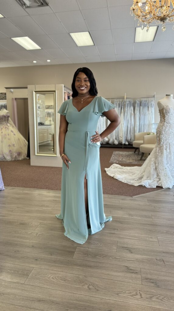 Colorful bridesmaid dress worn by a woman in a wedding shop in Melbourne, Florida