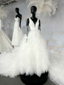 two wedding dresses on mannequins in a princess style at Aurora Bridal