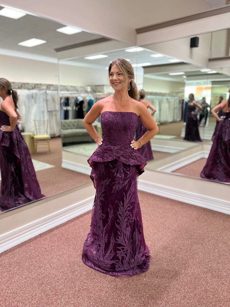 woman wearing a beautiful purple wedding dress at Aurora Bridal shop in Melbourne, FL